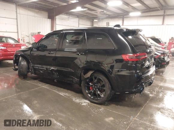 2017 Jeep Grand Cherokee SRT with VIN 1C4RJFDJ9HC739324, listed as a IAAI auction lot 40898998 with 92,547 mi miles. Bid and sale history available at carsss.com. Image 3.