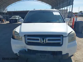 2006 Honda Pilot EX-L with RES with VIN 5FNYF28606B030602, listed as a IAAI auction lot 41392868 with 227,782 mi miles. Bid and sale history available at carsss.com. Image 12.