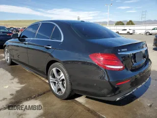 2018 Mercedes-Benz E 300 with VIN WDDZF4KBXJA464197, listed as a Copart auction lot 53205215 with 38,002 mi miles and Salvage title. Bid and sale history available at DreamBid. Image 2.