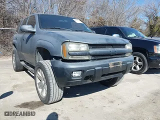 2004 Chevrolet TrailBlazer LS with VIN 1GNDT13S542140462, listed as a IAAI auction lot 41373253 with 176,174 mi miles. Bid and sale history available at carsss.com. Image 1.