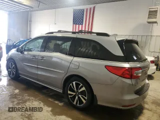 2018 Honda Odyssey Elite с VIN 5FNRL6H98JB036459, выставлен на аукционе Copart как лот 54231155 с пробегом 54 818 миль миль и Списание • Salvage title. История ставок и продаж доступна на DreamBid. Изображение 2.
