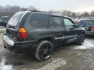2006 GMC Envoy SLT with VIN 1GKDT13S562338202, listed as a Copart auction lot 87326504 with 158,468 mi miles and Clean Title. Bid and sale history available at carsss.com. Image 3.