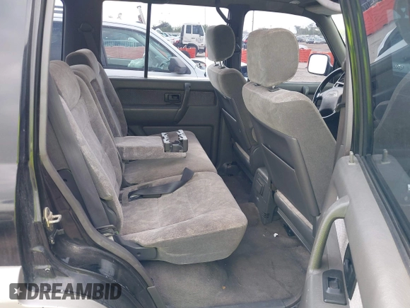 1999 Isuzu Trooper S with VIN JACDJ58X5X7902821, listed as a IAAI auction lot 40762329 with 182,773 mi miles and . Bid and sale history available at DreamBid. Image 8.