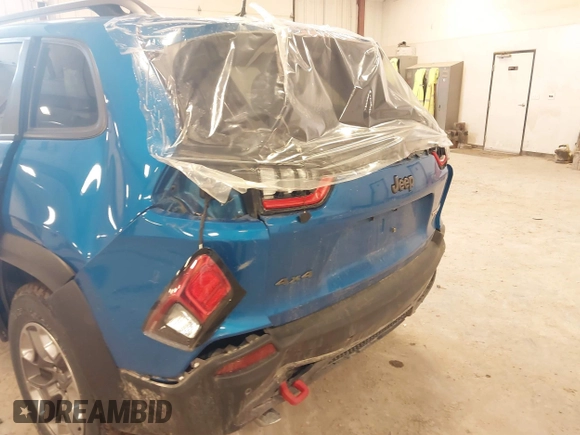 2019 Jeep Cherokee Trailhawk with VIN 1C4PJMBX4KD389637, listed as a IAAI auction lot 41740750 with 46,695 mi miles and . Bid and sale history available at DreamBid. Image 6.