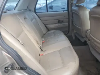2005 Ford Crown Victoria LX z VIN 2FAFP74W95X147431, wystawiony jako Copart lot #73487374 z przebiegiem 203 107 mil mil oraz Nie do naprawy • Non repairable. Historia ofert i sprzedaży dostępna na DreamBid. Obrazek 10.