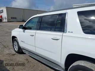2016 GMC Yukon XL SLE with VIN 1GKS1FKC0GR331459, listed as a IAAI auction lot 41557718 with 203,803 mi miles. Bid and sale history available at carsss.com. Image 14.