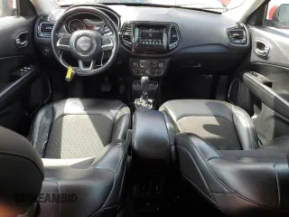 2020 Jeep Compass Latitude with VIN 3C4NJCBB0LT129253, listed as a Copart auction lot 57037305 with 136,006 mi miles and Salvage title. Bid and sale history available at DreamBid. Image 8.
