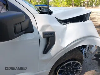 2023 Ford F-150 XL with VIN 1FTEX1EP8PFA78448, listed as a IAAI auction lot 42115100 with 31,433 mi miles and . Bid and sale history available at DreamBid. Image 6.