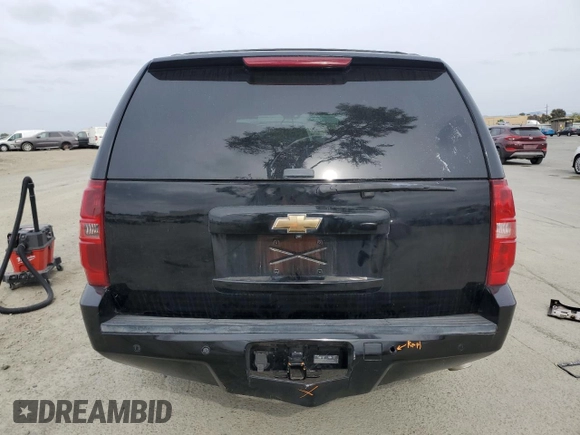 2013 Chevrolet Suburban LT with VIN 1GNSCJE01DR349353, listed as a Copart auction lot 54526315 with Not provided miles and Salvage title. Bid and sale history available at DreamBid. Image 6.