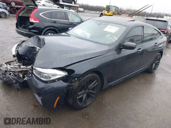 2018 BMW 6 Series 640i xDrive with VIN WBAJV6C55JBK07051, listed as a IAAI auction lot 41505732 with 96,172 mi miles and . Bid and sale history available at carsss.com. Image 16.