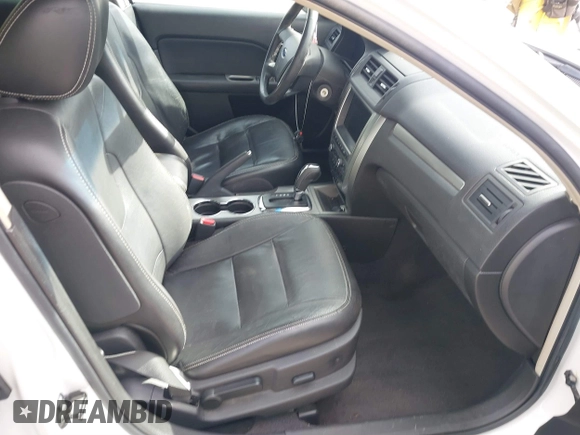 2010 Ford Fusion Hybrid with VIN 3FADP0L36AR140242, listed as a IAAI auction lot 41895012 with 236,943 mi miles and . Bid and sale history available at DreamBid. Image 5.