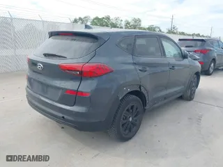2019 Hyundai Tucson SE with VIN KM8J23A46KU963736, listed as a IAAI auction lot 40647587 with 69,121 mi miles. Bid and sale history available at carsss.com. Image 4.
