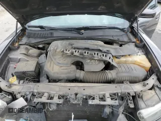 2014 Dodge Charger SXT z VIN 2C3CDXHGXEH261414, wystawiony jako Copart lot #55871705 z przebiegiem 221 000 mil mil oraz Szkoda całkowita • Salvage title. Historia ofert i sprzedaży dostępna na DreamBid. Obrazek 11.