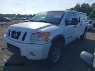 2008 Nissan Titan XE z VIN 1N6AA07FX8N309885, wystawiony jako IAAI lot #42847181 z przebiegiem 192 595 mil mil oraz . Historia ofert i sprzedaży dostępna na DreamBid. Obrazek 17.