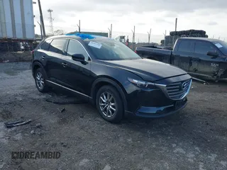 2017 Mazda CX-9 Touring with VIN JM3TCBCY5H0142400, listed as a IAAI auction lot 40987166 with 118,000 mi miles. Bid and sale history available at carsss.com. Image 1.