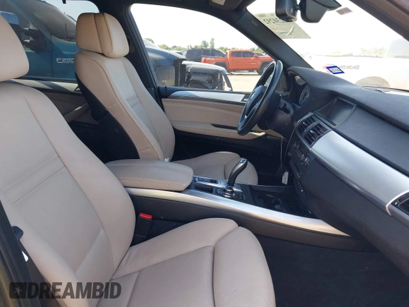 2012 BMW X5 35d with VIN 5UXZW0C51CL669957, listed as a IAAI auction lot 42230292 with 102,305 mi miles and . Bid and sale history available at DreamBid. Image 5.