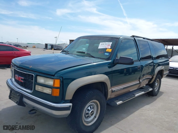 1998 GMC Suburban with VIN 1GKGK26J4WJ734958, listed as a IAAI auction lot 41878070 with 131,528 mi miles. Bid and sale history available at carsss.com. Image 6.