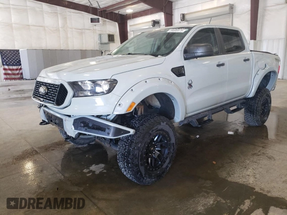 2021 Ford Ranger XL with VIN 1FTER4FH2MLD97098, listed as a Copart auction lot 56696975 with 21,565 mi miles and Salvage title. Bid and sale history available at DreamBid. Image 1.