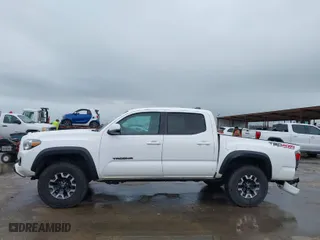 2021 Toyota Tacoma 4WD SR with VIN 5TFCZ5AN3MX265793, listed as a IAAI auction lot 41953190 with 94,648 mi miles. Bid and sale history available at carsss.com. Image 14.