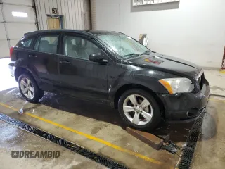 2011 Dodge Caliber Mainstreet with VIN 1B3CB3HA2BD106288, listed as a Copart auction lot 53635615 with 127,599 mi miles and Salvage Title. Bid and sale history available at carsss.com. Image 4.