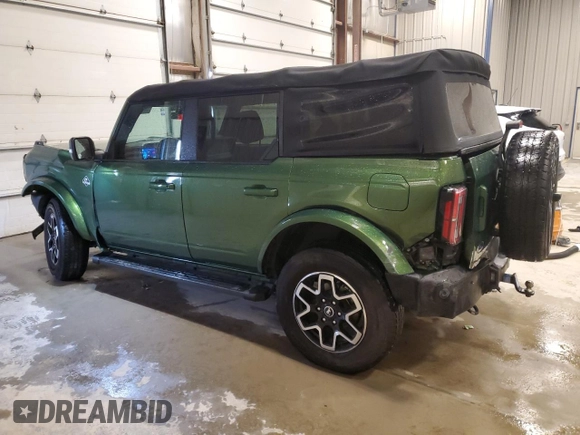 2022 Ford Bronco with VIN 1FMDE5DH1NLB59322, listed as a Copart auction lot 57809495 with 64,094 mi miles and Salvage title. Bid and sale history available at DreamBid. Image 2.