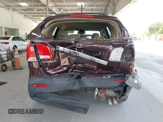 2012 Kia Sorento LX z VIN 5XYKT4A6XCG218424, wystawiony jako IAAI lot #42351646 z przebiegiem 185 016 mil mil oraz . Historia ofert i sprzedaży dostępna na DreamBid. Obrazek 16.