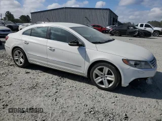 2013 Volkswagen CC Sport with VIN WVWBP7ANXDE565694, listed as a Copart auction lot 77947514 with 180,160 mi miles and Salvage Title. Bid and sale history available at carsss.com. Image 4.