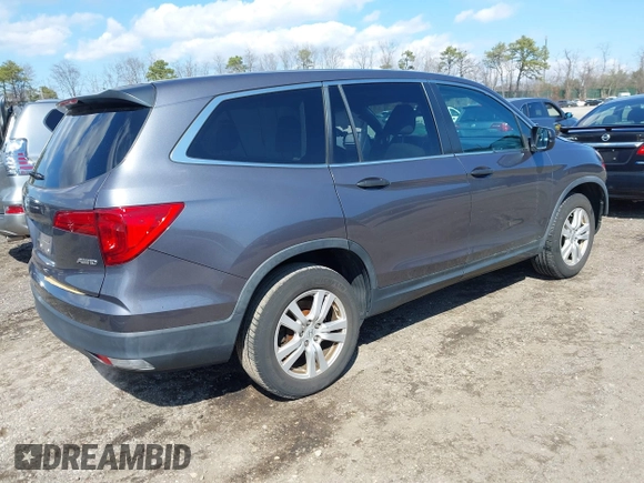 2016 Honda Pilot LX with VIN 5FNYF6H14GB082537, listed as a IAAI auction lot 41864525 with 137,097 mi miles. Bid and sale history available at carsss.com. Image 4.
