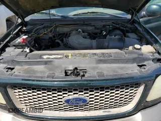2002 Ford F-150 XL z VIN 1FTRX17W52NB81525, wystawiony jako Copart lot #57981075 z przebiegiem 236 673 mil mil oraz Szkoda całkowita • Salvage title. Historia ofert i sprzedaży dostępna na DreamBid. Obrazek 11.