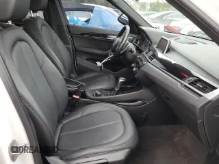 2018 BMW X1 sDrive28i with VIN WBXHU7C38J5H40248, listed as a Copart auction lot 66158662 with 59,903 mi miles. Bid and sale history available at carsss.com. Image 5.