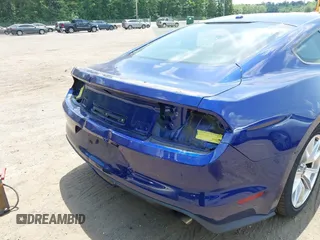 2015 Ford Mustang EcoBoost z VIN 1FA6P8TH9F5361668, wystawiony jako IAAI lot #42616707 z przebiegiem 73 798 mil mil oraz . Historia ofert i sprzedaży dostępna na DreamBid. Obrazek 6.