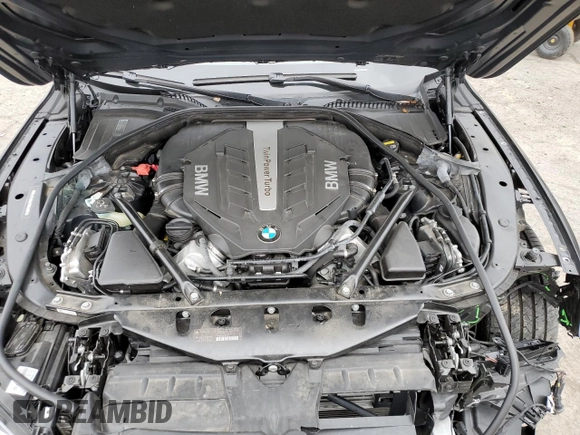 2015 BMW 7 Series 750Li xDrive z VIN WBAYF8C54FD654795, wystawiony jako Copart lot #82381894 z przebiegiem 56 968 mil mil oraz Szkoda całkowita • Salvage title. Historia ofert i sprzedaży dostępna na DreamBid. Obrazek 11.