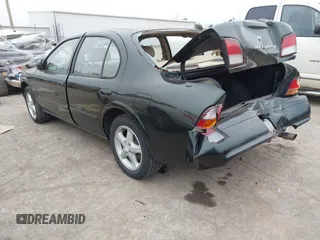 1998 Nissan Maxima GXE with VIN JN1CA21D4WT605270, listed as a IAAI auction lot 41505206 with 114,425 mi miles and . Bid and sale history available at DreamBid. Image 3.