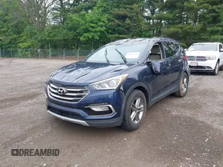 2017 Hyundai Santa Fe 2.4L z VIN 5XYZUDLB9HG421284, wystawiony jako IAAI lot #42441436 z przebiegiem 96 155 mil mil oraz . Historia ofert i sprzedaży dostępna na DreamBid. Obrazek 2.