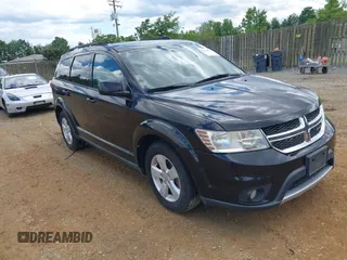 2012 Dodge Journey SXT z VIN 3C4PDDBG6CT325313, wystawiony jako IAAI lot #42330001 z przebiegiem 109 374 mil mil oraz . Historia ofert i sprzedaży dostępna na DreamBid. Obrazek 1.