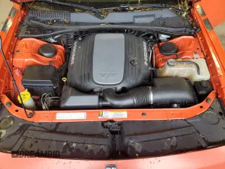 2009 Dodge Challenger R/T z VIN 2B3LJ54T09H593106, wystawiony jako Copart lot #58562535 z przebiegiem 134 380 mil mil oraz Szkoda całkowita • Salvage title. Historia ofert i sprzedaży dostępna na DreamBid. Obrazek 11.
