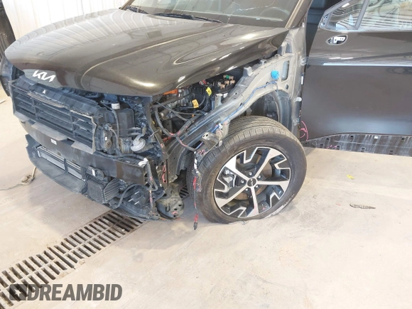 2023 Kia Sportage EX with VIN KNDPVCAG8P7095454, listed as a IAAI auction lot 42335661 with 96,718 mi miles and . Bid and sale history available at DreamBid. Image 6.