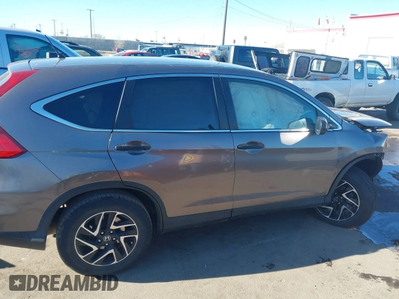 2016 Honda CR-V SE with VIN 5J6RM4H40GL118420, listed as a IAAI auction lot 41879744 with 105,792 mi miles and . Bid and sale history available at carsss.com. Image 14.
