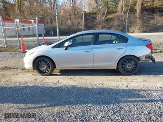2012 Honda Civic Sdn LX with VIN 2HGFB2F57CH319433, listed as a IAAI auction lot 41536201 with 135,514 mi miles. Bid and sale history available at carsss.com. Image 14.
