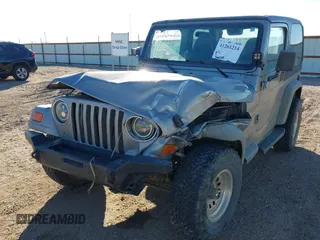 2001 Jeep Wrangler Sport with VIN 1J4FA49S91P324912, listed as a IAAI auction lot 41261214 with 260,299 mi miles. Bid and sale history available at carsss.com. Image 6.