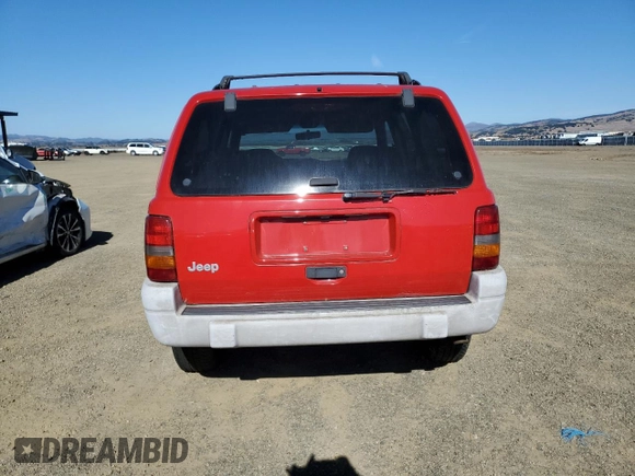 1998 Jeep Grand Cherokee Laredo with VIN 1J4GZ58S6WC370703, listed as a Copart auction lot 79691604 with 271,316 mi miles and Clean Title. Bid and sale history available at carsss.com. Image 6.