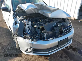 2015 Volkswagen Jetta SE z VIN 3VWD17AJ6FM257858, wystawiony jako IAAI lot #41007963 z przebiegiem 165 064 mil mil oraz . Historia ofert i sprzedaży dostępna na DreamBid. Obrazek 6.