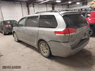 2013 Toyota Sienna XLE AAS with VIN 5TDYK3DC0DS370760, listed as a IAAI auction lot 41409383 with 213,198 mi miles. Bid and sale history available at carsss.com. Image 3.