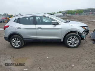 2017 Nissan Rogue SV with VIN JN1BJ1CR0HW120172, listed as a IAAI auction lot 42432543 with 116,938 mi miles and . Bid and sale history available at DreamBid. Image 13.