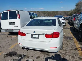 2013 BMW 3 Series 320i with VIN WBA3B1C56DF462549, listed as a IAAI auction lot 41411287 with 119,146 mi miles. Bid and sale history available at carsss.com. Image 16.