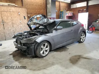 2013 Hyundai Veloster w/Black Int z VIN KMHTC6AD7DU162534, wystawiony jako Copart lot #54061425 z przebiegiem Nie podano mil oraz Szkoda całkowita • Salvage title. Historia ofert i sprzedaży dostępna na DreamBid. Obrazek 1.