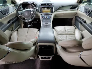 2017 Lincoln Continental Reserve with VIN 1LN6L9NC2H5614888, listed as a Copart auction lot 82712404 with 104,893 mi miles and Salvage Title. Bid and sale history available at DreamBid. Image 8.