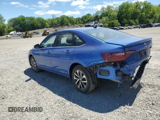 2023 Volkswagen Jetta S with VIN 3VW5M7BU6PM042471, listed as a Copart auction lot 56950155 with 7,043 mi miles and Salvage title. Bid and sale history available at DreamBid. Image 2.