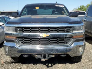 2016 Chevrolet Silverado 1500 LT with VIN 3GCUKREC5GG164823, listed as a Copart auction lot 52928575 with 221,836 mi miles and Clean Title. Bid and sale history available at DreamBid. Image 5.