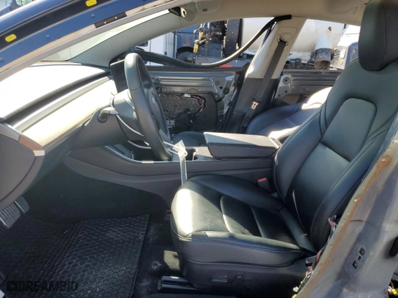 2019 Tesla Model 3 Mid Range with VIN 5YJ3E1EA9KF338197, listed as a Copart auction lot 45570415 with 0 mi miles and Salvage Title. Bid and sale history available at carsss.com. Image 7.